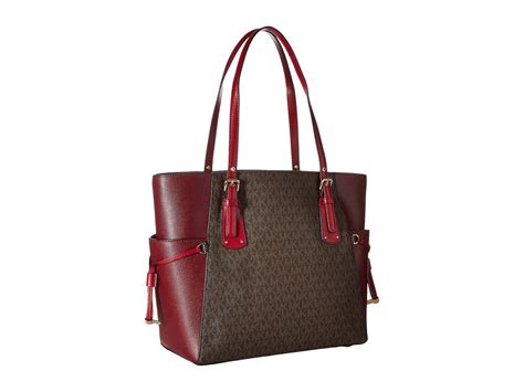 michael kors voyager east west tote oxblood|Michael Kors voyager tote merlot.